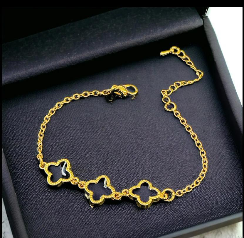 Gold Plated Black Clover Bracelet | Four Leaf Charm - Aaraasta | Ladies Fashion Pakistan